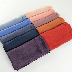 Solid cotton linen scarf for women featuring frayed edges in multiple color options