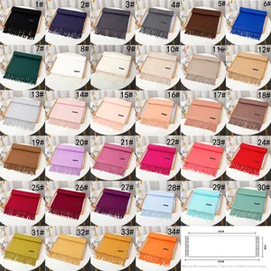 Detailed size guide and color variety of thick solid cashmere-like fringed scarf