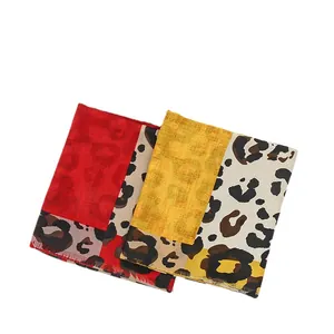 Fashionable cotton linen leopard print scarf with fringe in red and yellow dual-tone