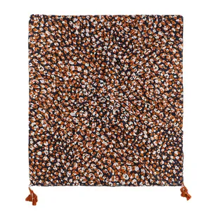 Orange leopard print scarf with tassels made of soft cotton-linen blend fabric