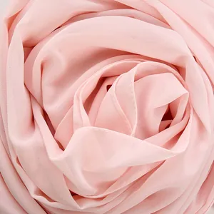 Pink breathable chiffon hijab scarf for women showing soft texture and rolled edges