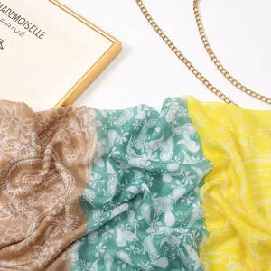 Lightweight voile scarf with paisley floral print in brown, teal and yellow blocks