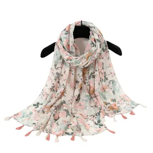 Floral linen-feel scarf with handmade tassels for beach sun protection and travel