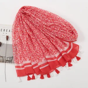 Red floral scarf shawl with fringes and white petal prints for beach vacation