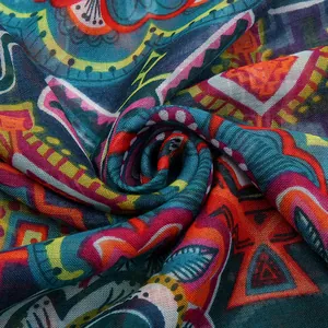 Bohemian style long fringed scarf with colorful geometric patterns and lightweight fabric