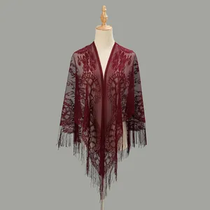Elegant wine red lace shawl featuring floral hollow-out patterns and long fringe tassels