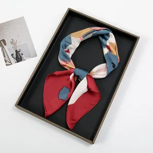 Artistic oil painting graffiti silk square scarf with colorful abstract print in a tray