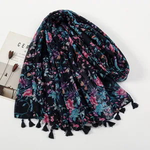 Floral print cotton-linen scarf with black tassels and colorful herbal patterns