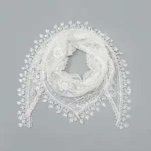 Elegant white floral lace triangular shawl with intricate hollow embroidery and fringe