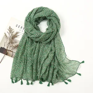 Dark green floral shawl with daisy patterns and fringe trim for summer beach outings