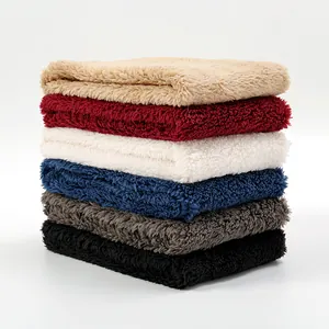 Detailed close-up showing six color variations of soft fleece knit neck warmers stacked