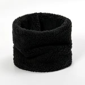 Close-up of thick black faux wool knit neck warmer showing soft plush texture for winter