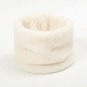Detail of soft off-white faux wool neck warmer with thick plush knitted texture