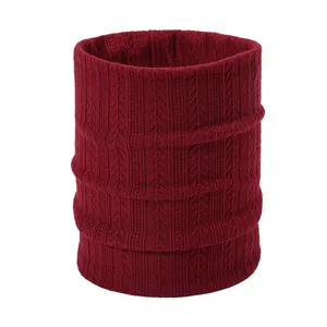 Detailed close-up of dark red knit neck warmer showing thick vertical stripe texture
