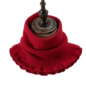 Women's warm red knitted snood scarf with honeycomb texture and elegant ruffled hem