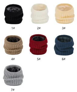 Detailed view of knitted snoods in seven colors with thick faux wool fleece lining