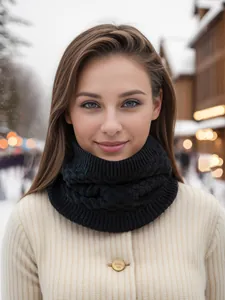 Close-up of black cable knit cowl scarf with premium wool-like texture and warm feel