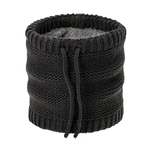 Detail of knitted winter neck warmer showing the thick grey fleece lining and drawstring