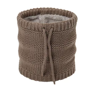 Detail of coffee-colored knitted neck warmer with thick fleece lining and adjustable drawstring
