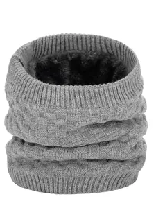 Detail showing the thick faux wool lining and grey knit pattern for cold protection