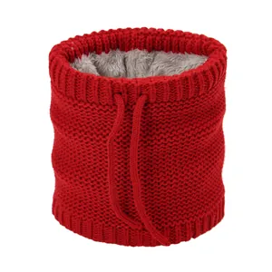 Detail of red knit neck warmer with thick grey fleece lining and adjustable drawstrings