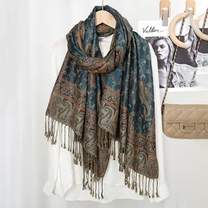 Elegant navy paisley shawl with fringe tassels styled over a white shirt for women