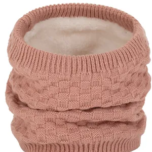 Winter knitted neck warmer in lotus pink with thick white fleece lining and waffle texture