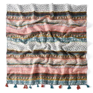 Ethnic floral bali yarn scarf with bohemian patterns and colorful fringe tassels