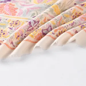 Bohemian paisley print beach shawl in soft bali yarn with orange and purple floral patterns