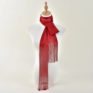 Fashionable red metallic yarn scarf for women featuring long tassels and lightweight fabric