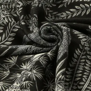 Lightweight black linen-feel scarf with tropical white palm leaf print for women