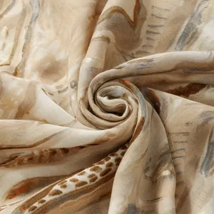 Ethnic cotton linen scarf with gold foil details and earthy color palette for sun protection
