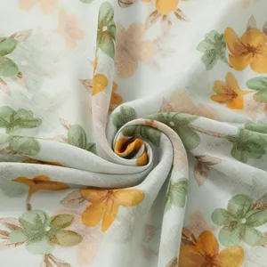 Floral print bali voile scarf with yellow blossoms and soft breathable fabric texture