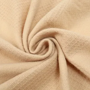Elegant apricot faux cashmere scarf with waffle texture and soft fringe for autumn winter