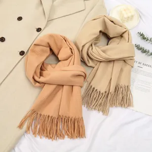 Solid cashmere-like waffle knit scarves with fringes in caramel and beige colors