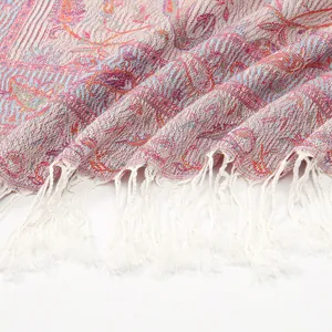 Ethnic paisley polyester shawl with white tassels for travel and fashion style