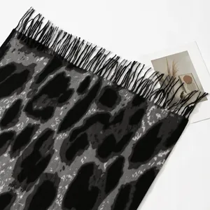 Thick leopard print cashmere scarf in grey and black with stylish black tassels