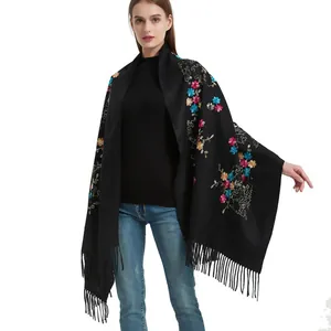 Elegant black shawl with colorful floral embroidery and long fringes for women's winter fashion