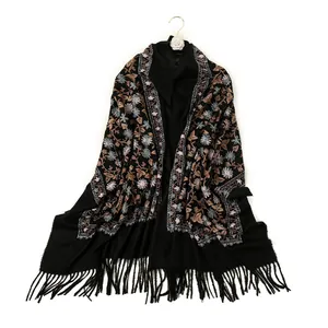 Elegant black cashmere shawl with detailed floral embroidery and fringe tassels