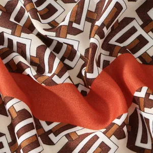 Autumn lightweight cotton-linen touch scarf with geometric print and orange borders