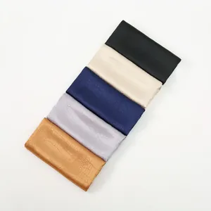 Fall-winter scarves with glossy snake skin texture shown in five elegant color options