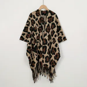 Women's leopard print knit shawl with thick fringe hem for fall and winter seasons