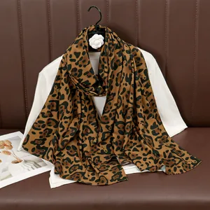 Elegant leopard print long scarf for women styled as a lightweight breathable shawl
