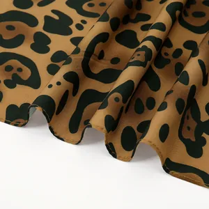 Lightweight leopard print cotton scarf for women with elegant draped leopard pattern