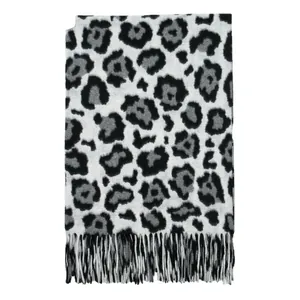 Thick leopard print shawl with fringe tassels in classic black and grey tones
