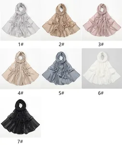 Detailed grid view of pleated linen-feel floral scarves in seven versatile pastel colors