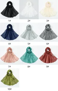 Collage showing ten shimmering silk-like pashmina shawls in various vibrant colors