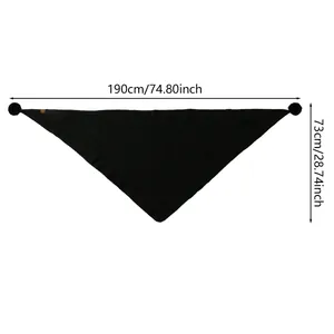 Flat lay of black triangle shawl with pom-pom trim showing 190x73cm dimensions