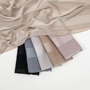 Elegant floral cotton-linen feel scarves in various colors including blue, grey and khaki