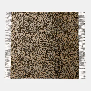 Close-up of leopard print cashmere feel square scarf with delicate fringe details